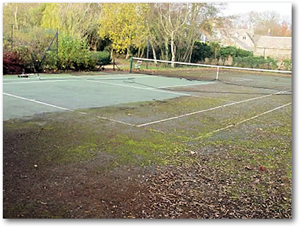 Partially cleaned tennis court